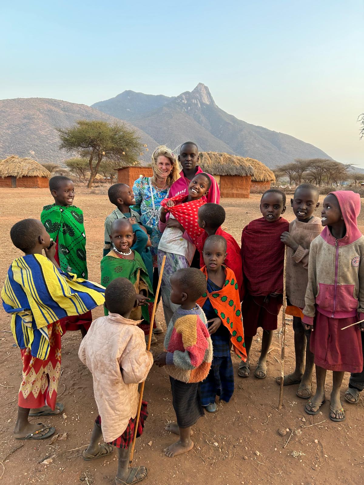 Children gathered in community outdoor space