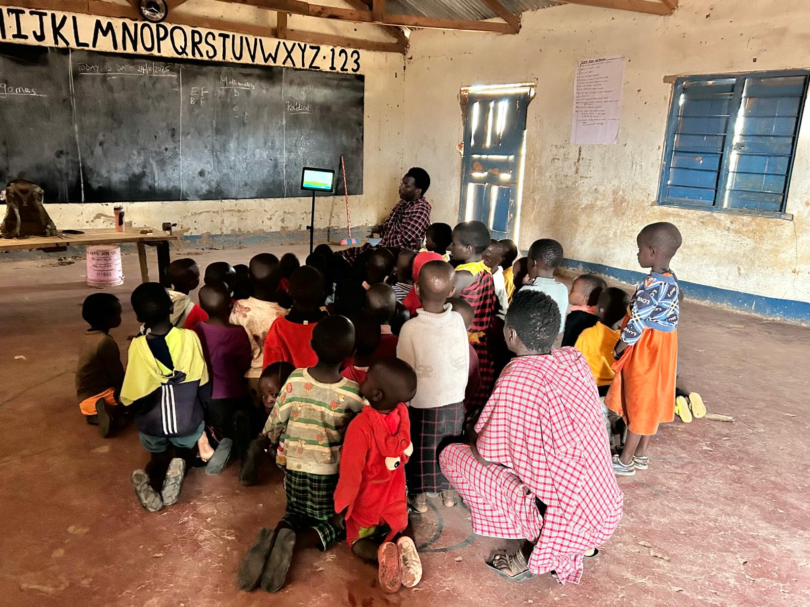 Young students watching a lesson at the community center